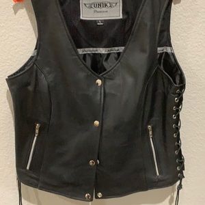 Ladies genuine leather motorcycle vest.